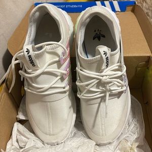 Beautiful gently worn Adidas sneakers.